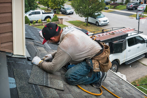 Professional Roof Installation technician working in Elliott, IA